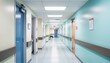 © Natalya - Modern hospital corridor interior with bright lighting and colorful walls reflecting healthcare environment