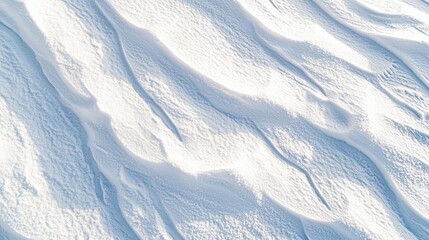 Poster - Glistening snow covers the ground, forming gentle waves and soft ridges that capture the quiet beauty of a winter landscape. The pristine white surface invites tranquility and reflection