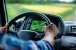 © gankevstock - Driver navigating a truck with GPS in a rural landscape