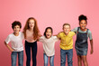 © Prostock-studio - Portrait of multiethnic schoolkids smiling over pink background