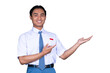 © panadesignteam - Indonesian Male High School Student in Uniform Presenting Gesture Isolated Transparent