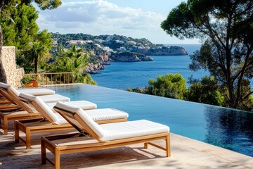 Poster - Serene Infinity Pool Overlooking Beautiful Coastal Landscape with Blue Ocean and Lush Greenery in a Luxurious Vacation Retreat