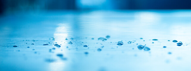Wall Mural -  Water drops on blue background