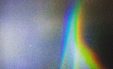 Fototapete - Abstract gradient light leak spectrum, vibrant colors, fluid motion, grainy noise texture on dark background, dreamy vintage nostalgic cinematic overlay music background design.