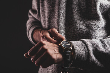 Wall Mural - man with watch in hand.