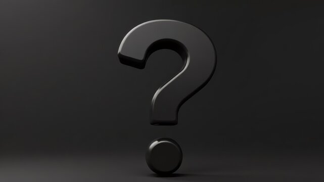 black question mark close up on dark background