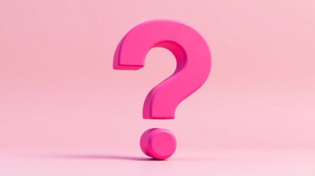 pink question mark close up on pink background