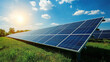 © PACHARA - A solar panel array is in a field with a bright sun in the background