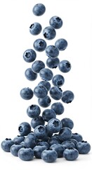 Wall Mural - Fresh blueberries falling in mid-air against a white background