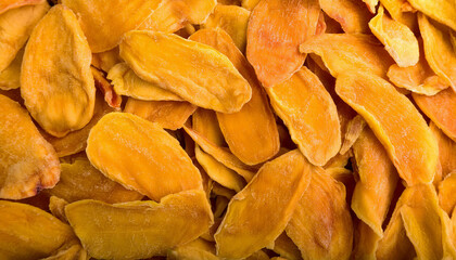 Fototapete - Repeating pattern of dried mango slices, highlighting their chewy texture and bright orange color. Perfect for tropical, healthy snacks, or natural food themes. Texture, background.
