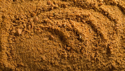 Fototapete - Repeating pattern of pumpkin spice mix, highlighting its fine, powdery texture and warm orange-brown color. Ideal for autumn, baking, or cozy food themes. Texture, background.