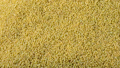 Fototapete - Repeating pattern of tiny couscous grains, emphasizing their uniform size and golden color. Ideal for Mediterranean cuisine or healthy food concepts. Texture, background.