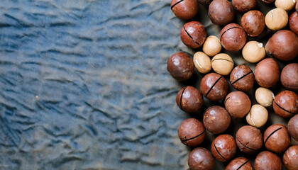 Fototapete - Background featuring macadamia nut texture, showcasing their smooth surface and creamy beige color. Ideal for healthy snacks, baking, or natural food concepts. Texture, background.