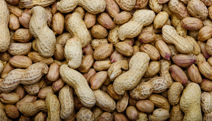 Fototapete - Background featuring peanut texture, highlighting their rough surface and earthy tones. Perfect for healthy snacks, baking, or natural food themes. Texture, background.