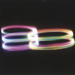 Poster - Rainbow Light Trails Abstract Knot Infinity Symbol Long Exposure Art Photography On Dark Background