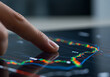 © Bboy - finger touching Stock market trading chart