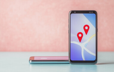 Poster - Smartphones with map and location pin on screen showing mobile navigation. Mobile phones showing map with location pin on the screen. Mobile navigation on smartphones