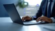 © Stocks Buddy - A businessman using a laptop with chatbot conversations and online social media profile icons floating on the screen, illustrating AI customer profiling, customer segmentation