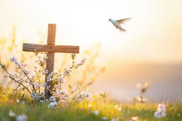 Rustic wooden cross on grassy hillside at dawn with flying dove and wildflowers in Easter light