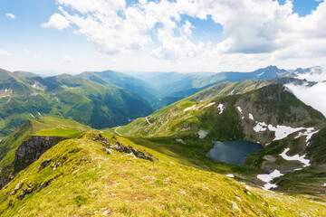 Wall Mural - mountain landscape of romania in summer. sunny day. beautiful outdoor scenery with alpine lake. scen