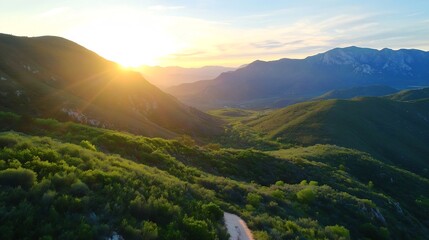 Wall Mural - Breathtaking sunset over rolling hills in a serene mountain landscape with lush green vegetation : Generative AI