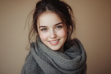 Aufkleber - A happy young woman wearing a scarf and smiling