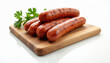 © Vadym - Smoked grilled sausages with green parsley on wooden board. Cooked pork sausages are delicious appetizer. Meat product for bar-b-q. BBQ snack. Ready to eat. Close-up view.