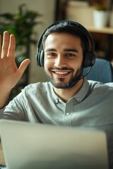 Poster - A person focused on their work, wearing a headset and typing away on their laptop