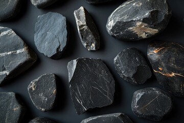 Poster - A collection of rocks sitting on a table, great for decorative or scientific purposes