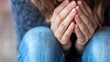 © Generative AI - A close up of hands covering a face with emotions reflecting vulnerability and sadness : Generative AI