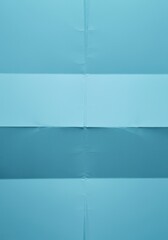 Poster - Close up view of folded light blue paper forming an intricate abstract pattern, showcasing the delicate textures and unique creases created by the careful folds