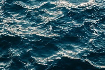 Wall Mural - deep blue ocean waves with light reflection on water surface