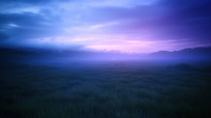 Wall Mural - a serene view of a misty landscape with purple and blue hues during dusk.