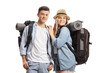 © Ljupco Smokovski - Young male and female backpackers smiling at camera