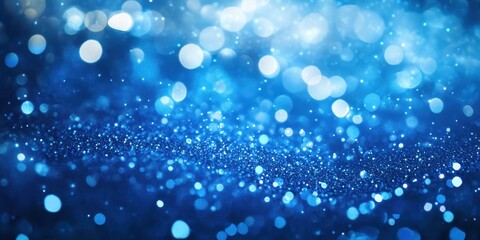 Abstract shimmering background with blue bokeh and sparkling particles