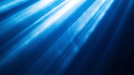 Poster - Bright sunlight filters through the deep blue waters, creating a mesmerizing dance of light and shadows below the surface. The ocean's serenity is enhanced by the shimmering rays