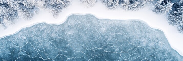 Poster - Breathtaking aerial view of a frozen lake surface covered with snow and ice, surrounded by snowy trees, creating a serene winter landscape with beautiful textures and patterns
