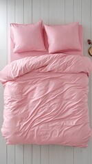 Poster - A soft pink striped duvet cover rests on a neatly made bed, accompanied by matching pillows, creating a warm and inviting atmosphere perfect for relaxation and dreams