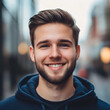 © karthikeya kamath - Young man smiling at camera, genuine portrait