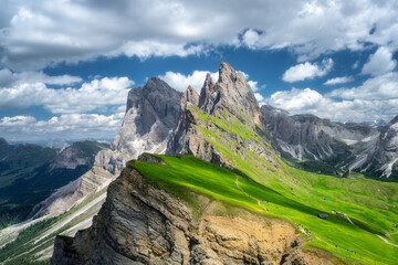 Wall Mural - aerial view of seceda mountain in summer in dolomites, italy. colorful landscape with mountain peaks