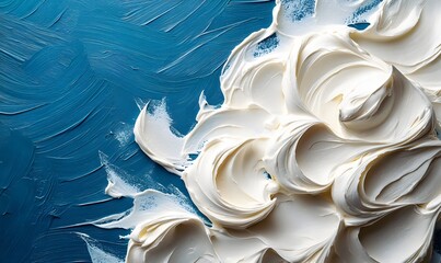 Poster - abstract texture of swirling white cream on deep blue background for creative designs