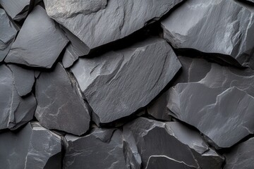 Poster - A close up of a rock wall with many different sized rocks