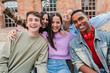 © Jose Calsina - Joyful group of five young friends smiling brightly while posing together for a fun photo, showcasing their happiness and connection in a lively gathering filled with laughter and excitement