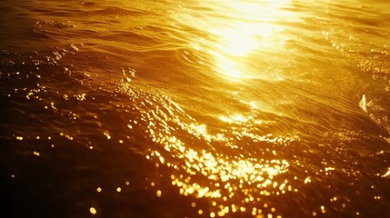 Poster - Sunset Glow Reflecting on Calm Ocean Water Creating a Golden Shimmering Effect in the Late Afternoon Sky