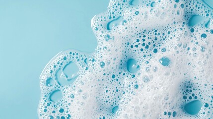 Poster - A vibrant blue background features fluffy soap foam, showcasing an array of small bubbles. This refreshing texture evokes feelings of cleanliness and invigorating comfort, perfect for relaxation