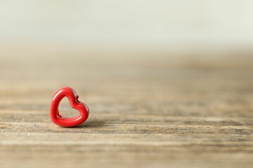 Canvas Print - Red decorative heart on wooden table, space for text. Happy Valentine's day