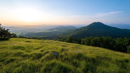 Aufkleber - Scenic Panoramic View of Lush Green Hills and Majestic Mountains Under a Beautiful Sunset : Generative AI
