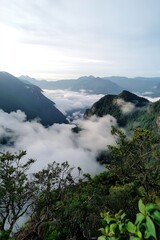 Poster - Breathtaking Mountain Landscape with Clouds and Valley for Nature Enthusiasts and Adventure Seekers : Generative AI