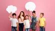 © Prostock-studio - Cute multinational schoolchildren with empty speech bubbles on pink background, space for design