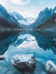 Poster - Majestic mountain landscape with a clear lake reflecting snowy peaks under a cloudy sky : Generative AI
